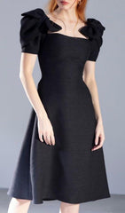 PATCHWORK BOW-EMBELLISHED MIDI DRESS IN BLACK