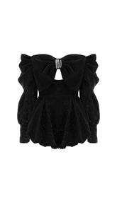 VELVET STRAPLESS JUMPSUIT IN BLACK