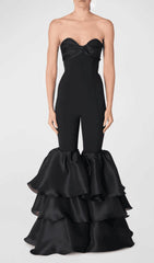 BLACK STRAPLESS JUMPSUIT WITH TIERED RUFFLE HEM