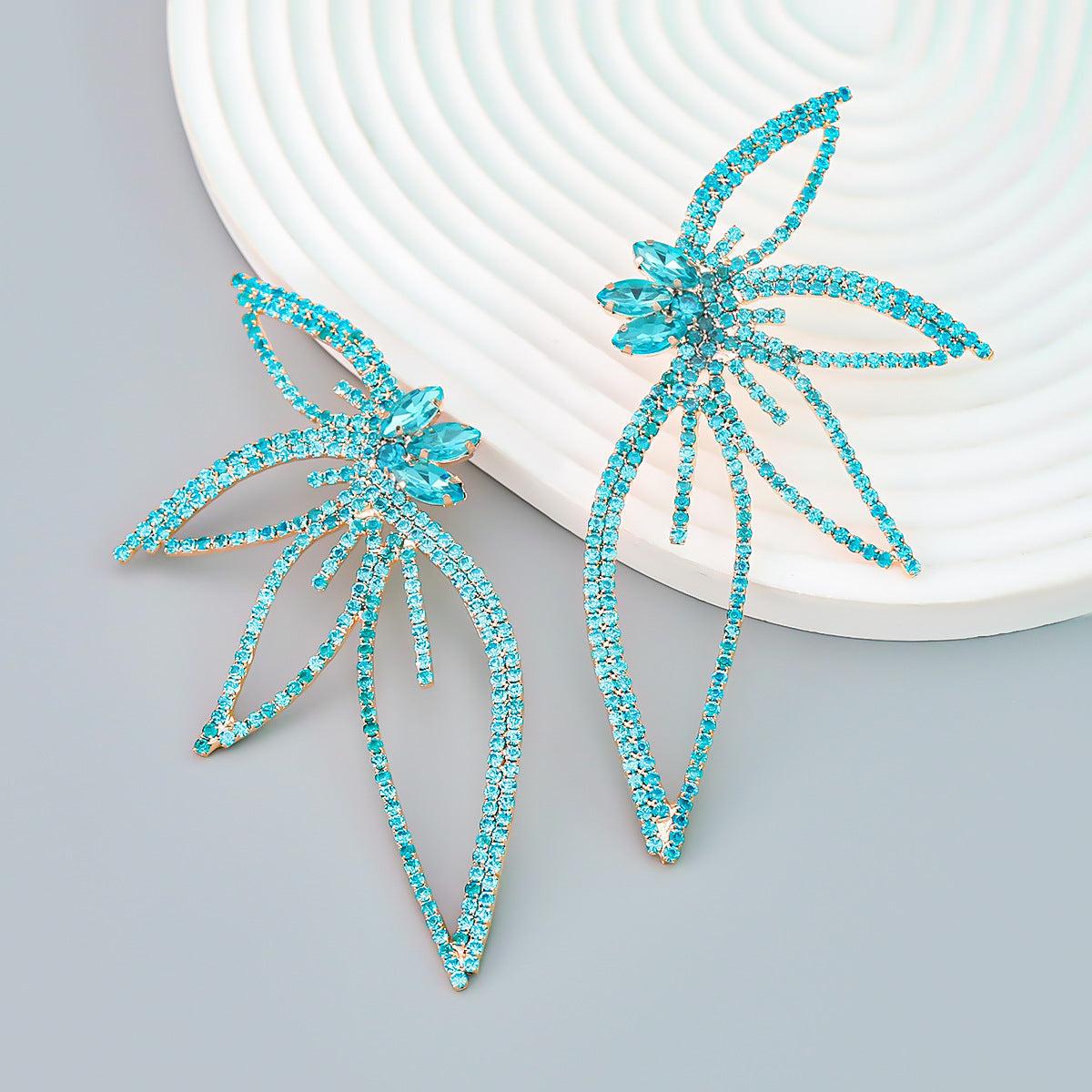 CRYSTAL FLOWER EARRINGS IN BLUE