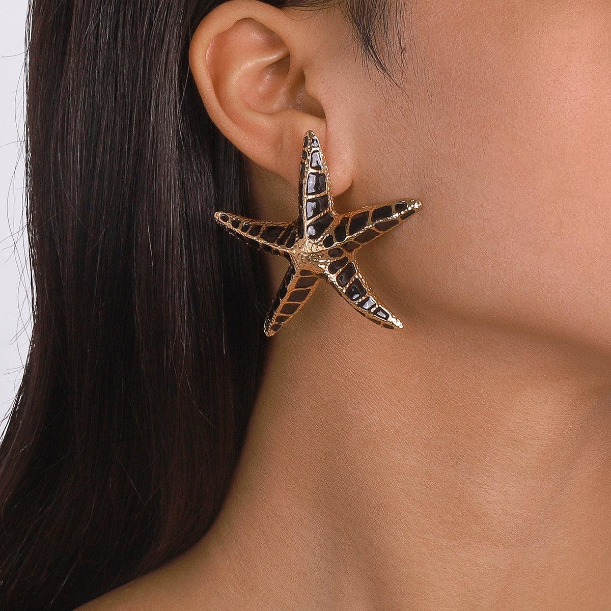 STARFISH EARRINGS IN BLACK