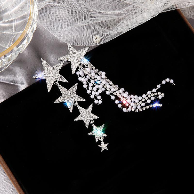 ASYMMETRICAL STAR EARRINGS