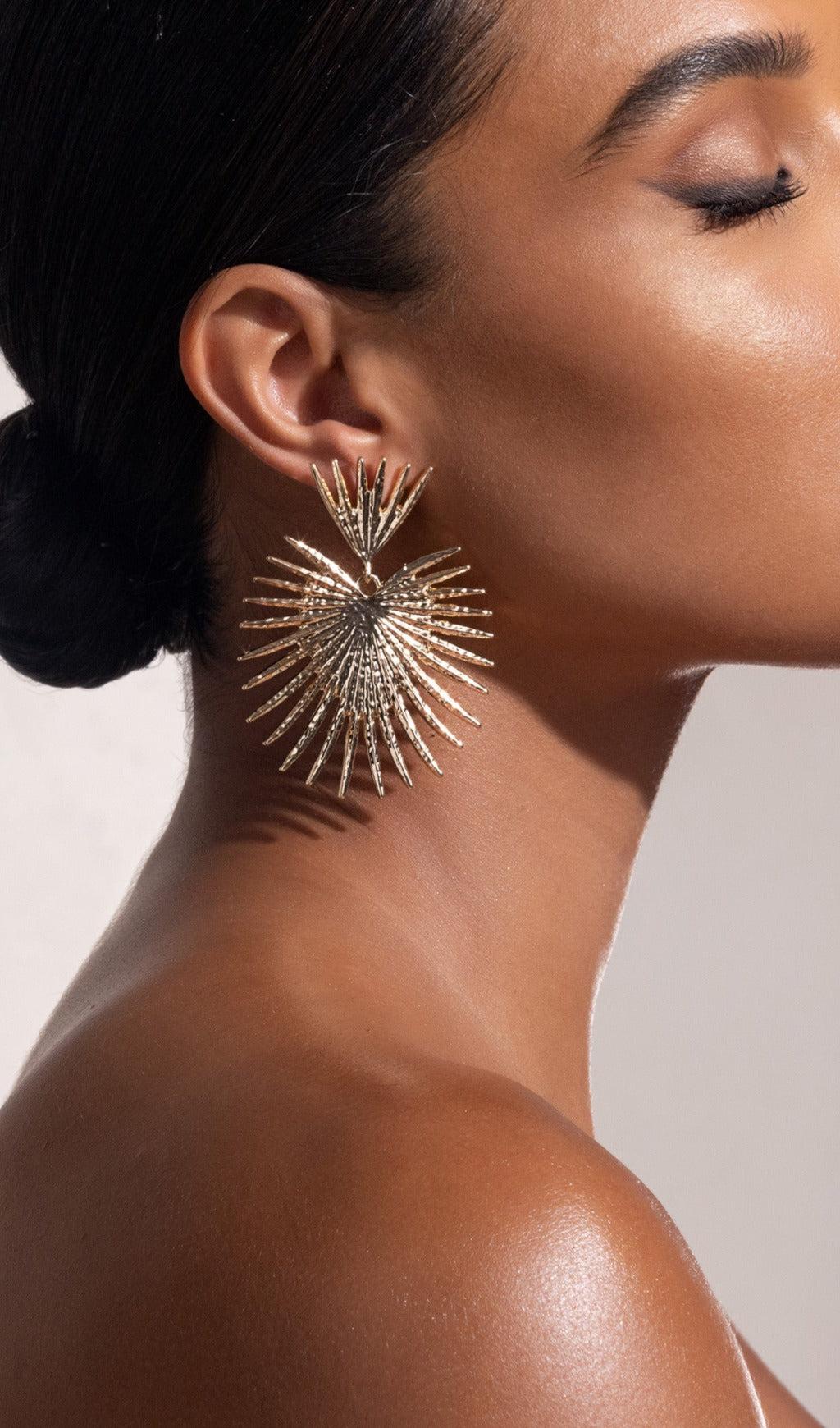 GOLD STARBURST DROP EARRINGS