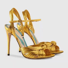 STRAPPY HEEL SANDALS IN GOLD