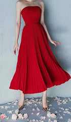 PLEATED STRAPLESS MIDI DRESS IN WINE RED