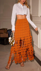 CIRCLE CUTOUT FRINGE SKIRT IN ORANGE